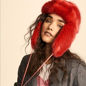 Heurueh Faux fur trapper hat with pink Pom Pom